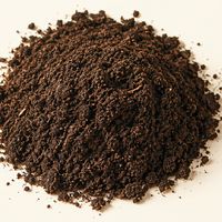 A small heap of dark, crumbly compost soil